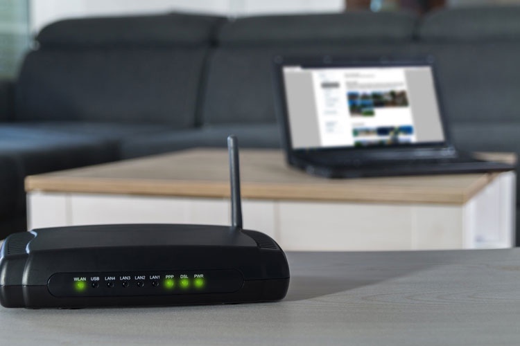 How to update the firmware of a Linksys range extender?