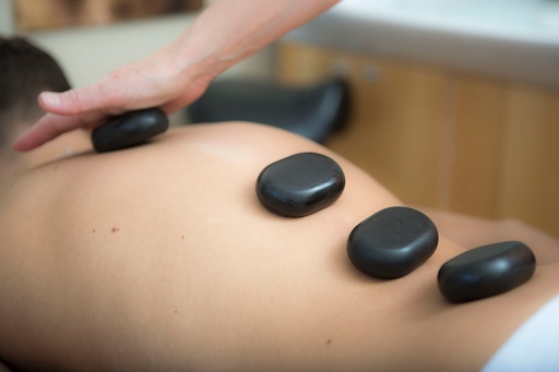 How Can Swedish Hot Stone Massage Therapy Heal Your Body and Mind?