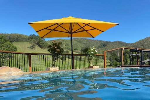 HOW TO CHOOSE THE PERFECT UMBRELLAS FOR YOUR HOTEL POOL AREA