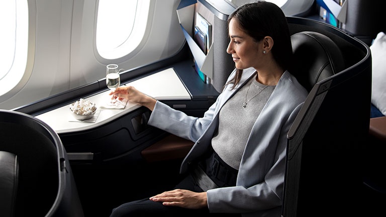 Can I upgrade from Economy to Business class on Lufthansa Airline?