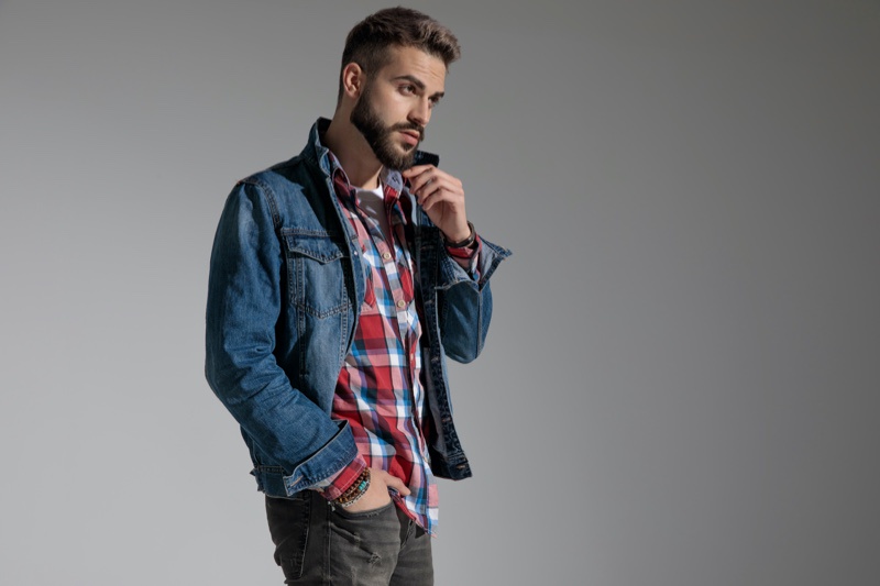 Layer a denim jacket over a plain sweatshirt for a casual yet stylish look