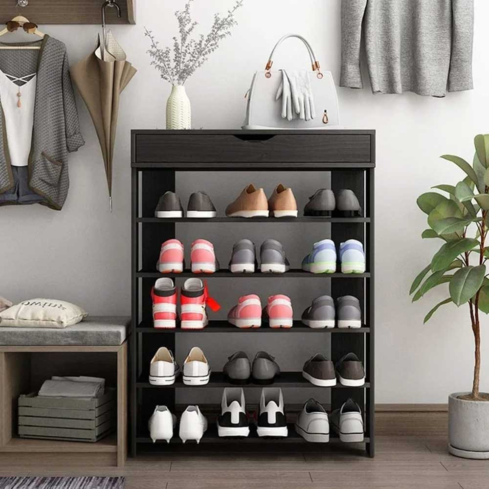 Decluttering Your Living Spaces: Using a Shoe Cabinet as Multi-Purpose Storage.