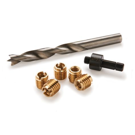 Why are brass inserts threaded?