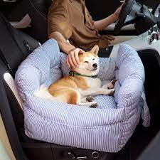 Ensuring Safe Travels: The Importance of Dog Car Seats | Pups n Beds