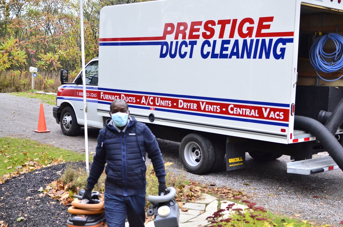 What are the signs that indicate a need for duct cleaning in Ajax?