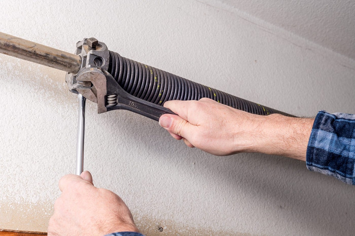 Expert Guide to Broken Garage Door Spring Repair by Simo Garage Door LLC.
