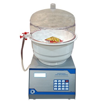 What types of packaging can be tested with the Vacuum Leak Tester?