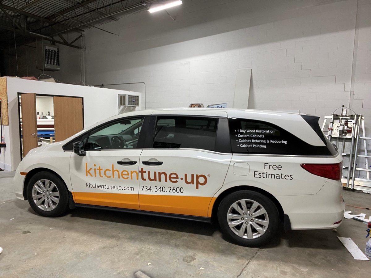 Drive Your Brand Forward with Custom Van Wraps