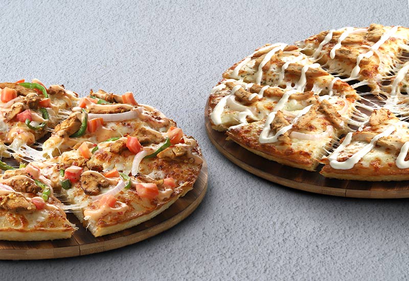 Conquering Cravings with Clicks: A Guide to Online Pizza Ordering with Domino's Pakistan