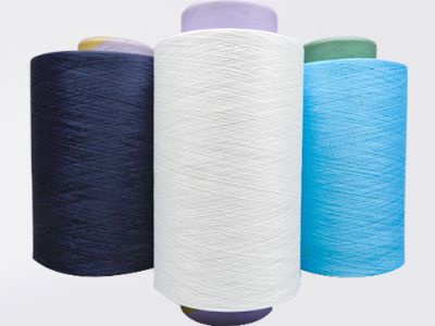 How does yarn twist affect dimensional stability?