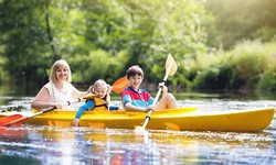 What safety precautions should I take before and during a kayaking trip?
