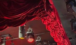 The Art and Craft of Custom Stage Curtains: Elevating Performances through Fabric and Design
