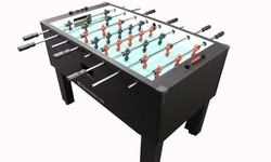 Elevate Your Space with Black Aquarium Bridle Leather Campaign Chair and Gold Standard Games Pro Foosball Table