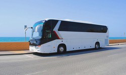 "City Lights and Comfort Rides: Bus Rentals for Dubai Tourists"