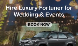 Experience luxury on your wedding day with a Fortuner car rental.