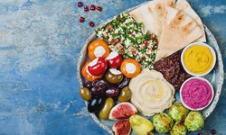 What beverages are commonly enjoyed with Mediterranean food?
