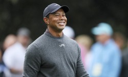 Woods receives 137.6 billion won in bonus for ‘not moving’