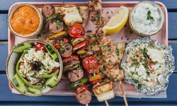 How is Greek food typically served?
