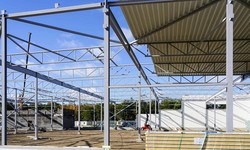 Is it cheaper to build your own metal building?