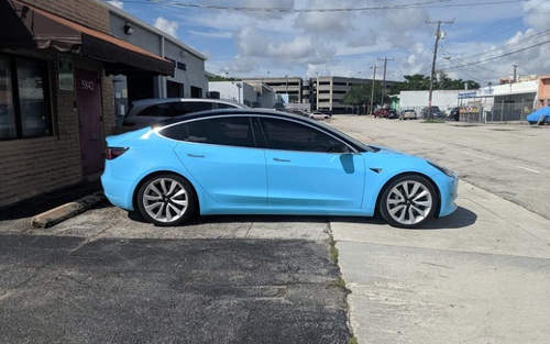 4  Reasons Why You Should Choose Tesla Model 3  Wrap Matte Black Over Painting:
